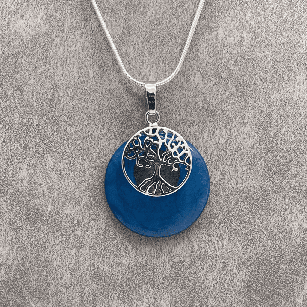 Natural Agate Donut Stone with a Platinum Tone Tree of Life Pendant
